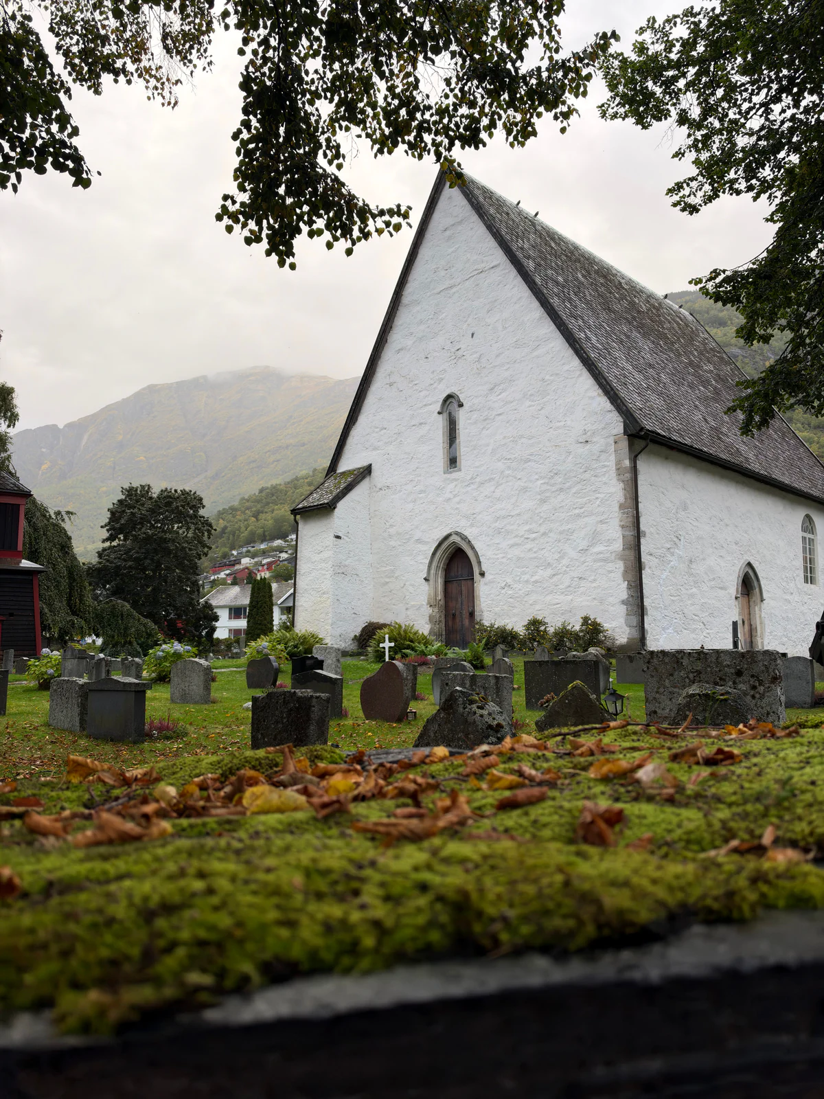 White stone church and cemetery